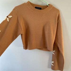 Light orange cropped embroidered sweater